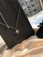 Apm Monaco six-pointed star single shooting star rose gold necklace
